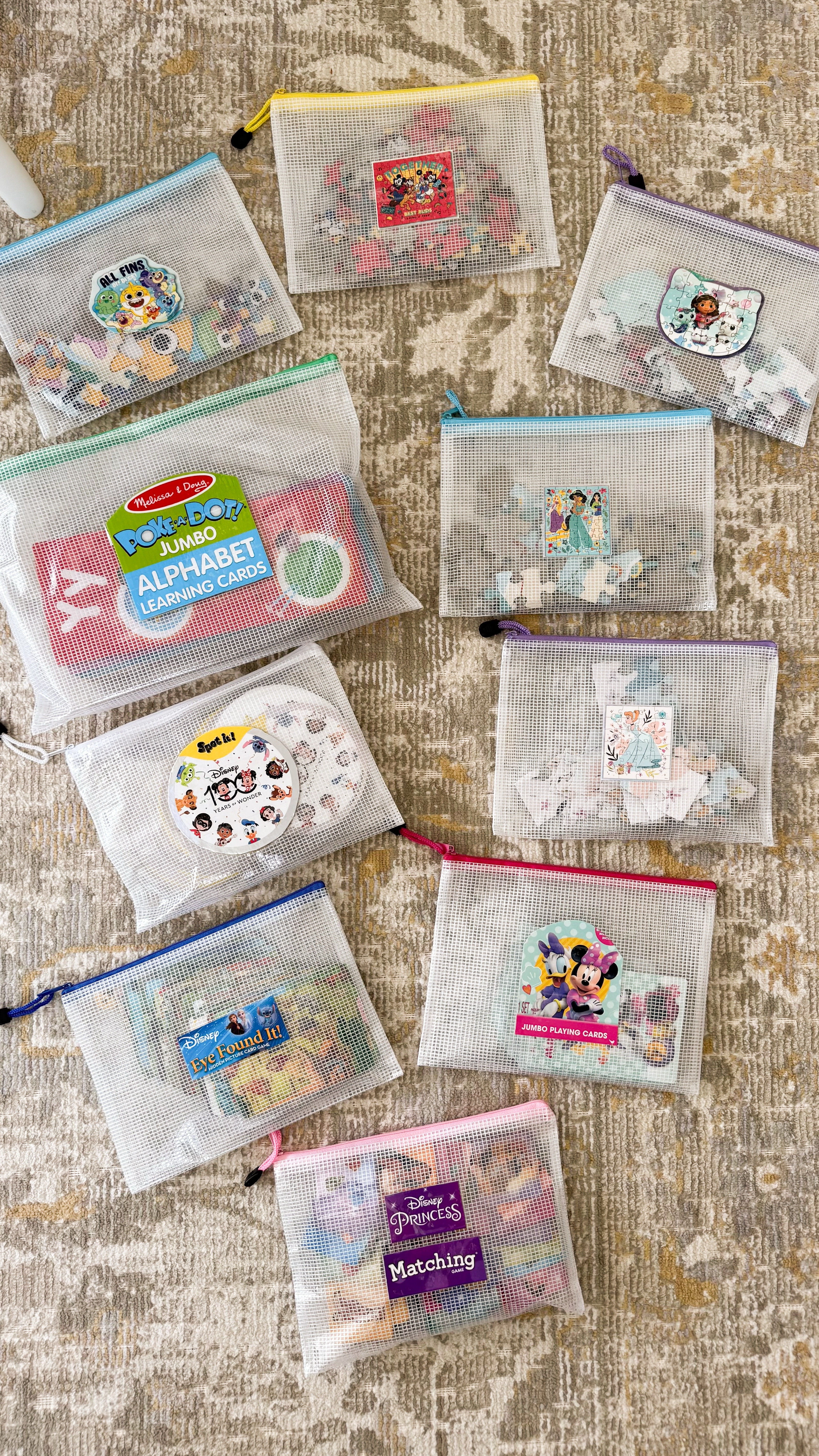 Kids games and puzzles organization using mesh pouches! It was hard to let go of the pretty boxes but I'm so glad I did this and it saves so much space! 

Zipper pouch, puzzles for kids, spot it Disney card game, Melissa and Doug alphabet learning cards, storage combination with boxes, Disney eye found it and princess matching game, mesh pouches, playroom storage 

#LTKHome #LTKKids #LTKSummerEdit