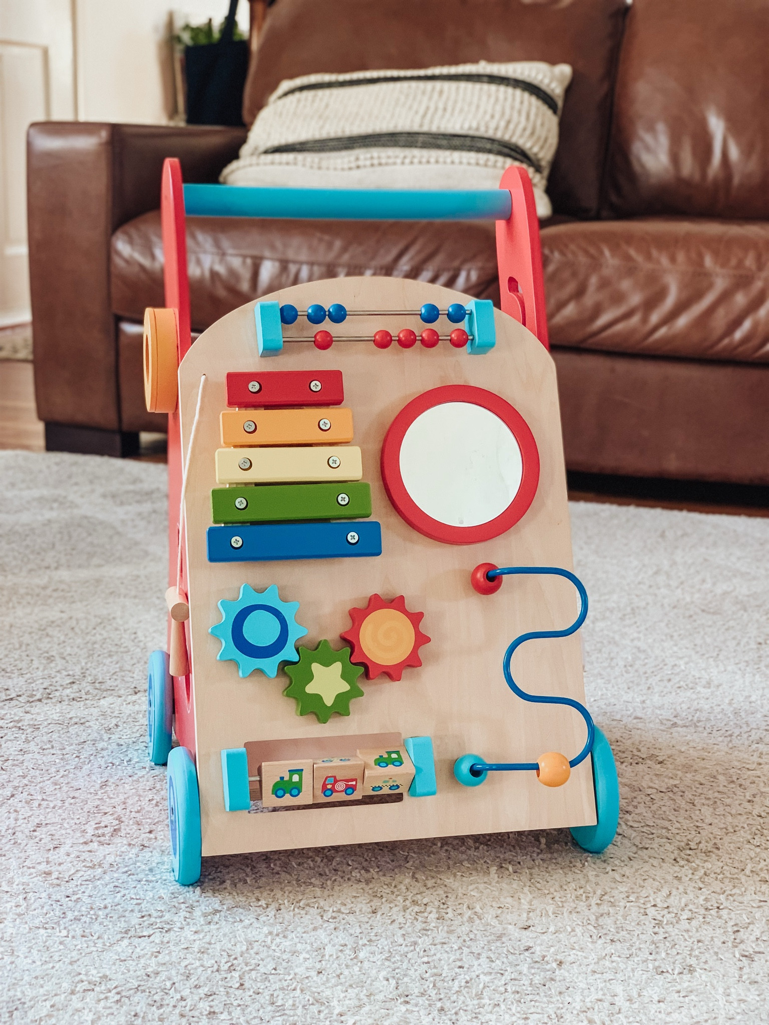 Wooden walker and activity center, perfect for your little one who is learning to sit and then when they are ready to walk  

#LTKBump #LTKFamily #LTKBaby