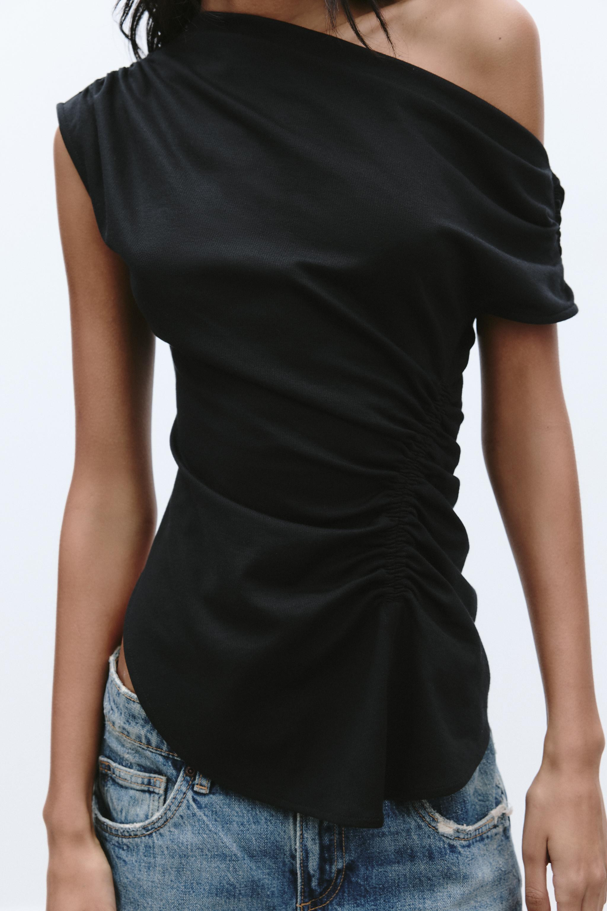 Boat neck sleeveless top. Features ruching on the shoulders and side. Asymmetric hem. | Zara US