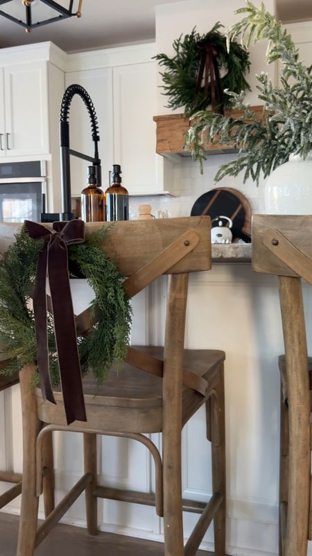 Christmas decor, wreath, small wreath, counter stools, Christmas trees, vase, Norfolk pine stems 

#LTKhome #LTKHoliday #LTKVideo