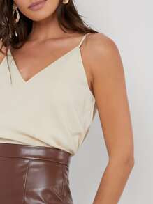 SHEIN Solid V Neck Cami Top
   SKU: swvest07201027499      
          (9999+ Reviews)
           ... | SHEIN