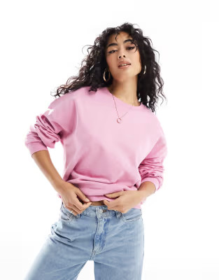 ASOS DESIGN oversized sweatshirt in bright pink | ASOS (Global)