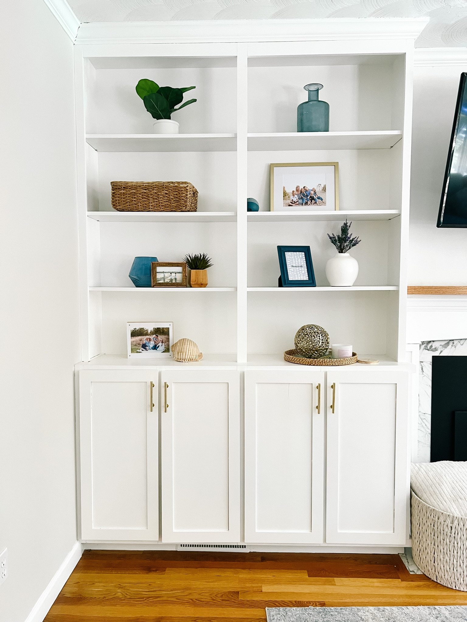 Ceramic vases with lavender are the perfect spring refresh for my built ins! I love this big rope coiled basket for my blankets and the folio box. // target home decor // Target spring decor // built ins // bookshelf decor 

#LTKSeasonal #LTKhome #LTKunder50