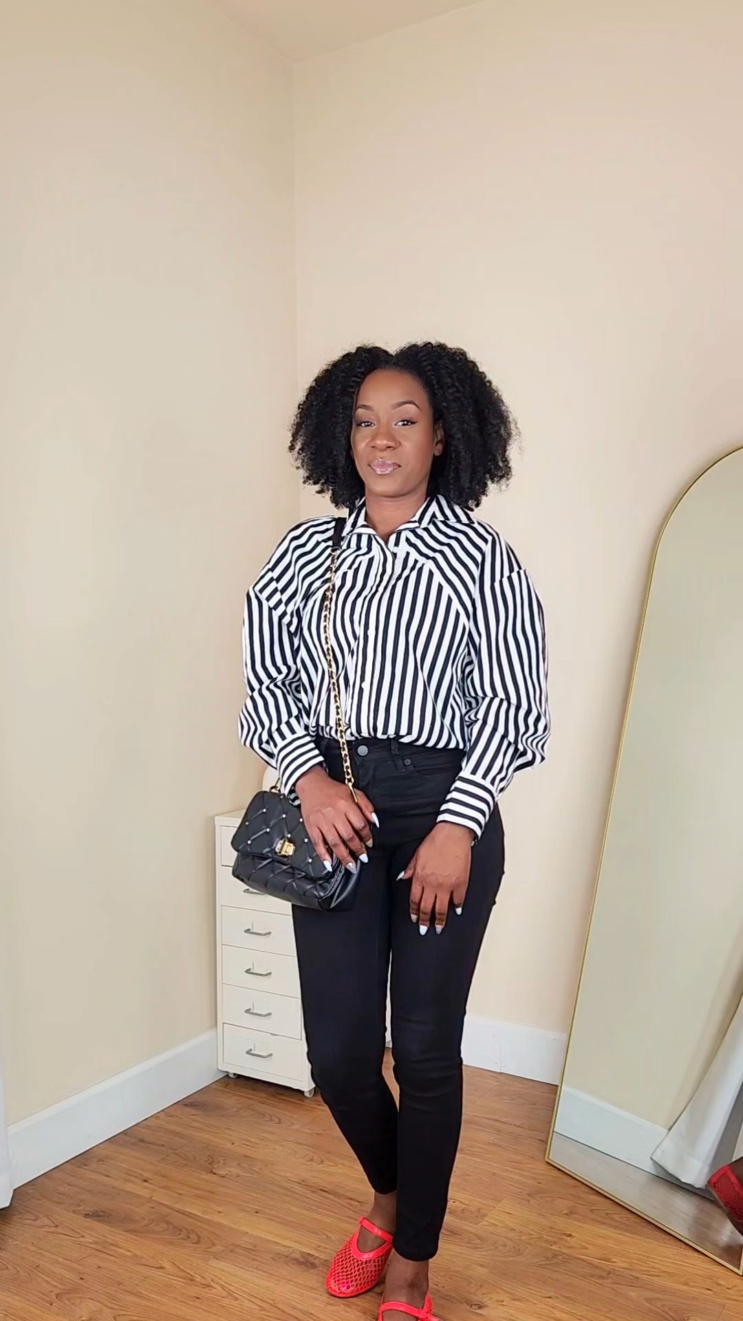 Today's ootd is a black and white outfit styled with a pop of red using these trendy mesh Mary Jane flats. The striped button-down shirt paired with black pants creates a classic, polished look, while the red flats instantly elevate the outfit. Perfect for everyday wear, casual outings, or when you want to look put together with minimal effort. #dresstoexpress @Express 

#LTKSaleAlert #LTKootd #LTKgrwm