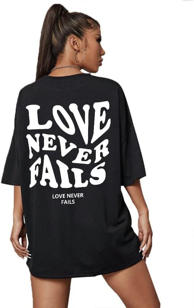 Love Never Fails Letter Print Womens Round Neck Oversized Tshirts Half Sleeve Drop Shoulder Boyfr... | Amazon (US)