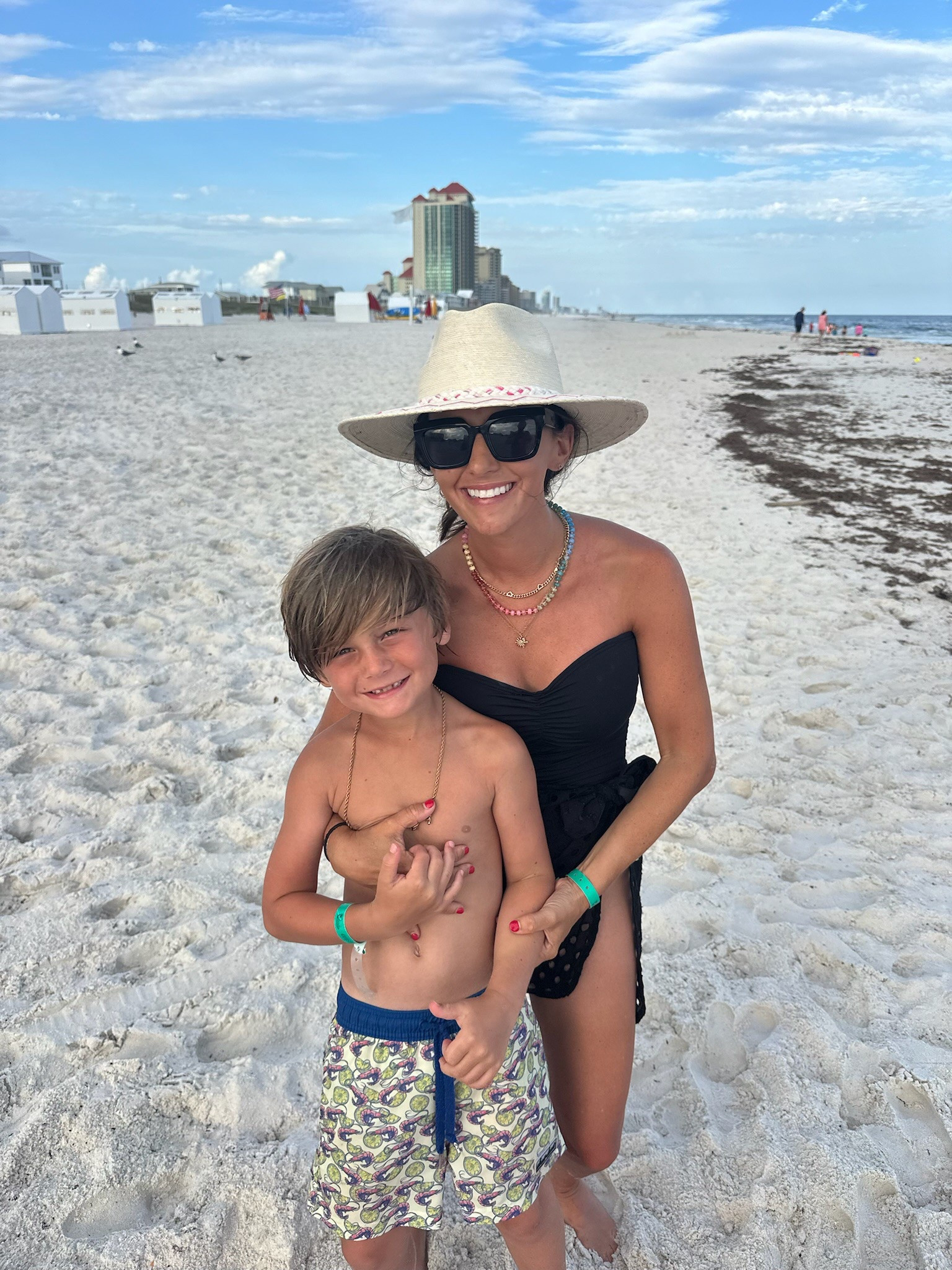 Mom beach approved outfit- so easy and comfortable 
Small in swimsuit and large in sarong wrap for more coverage 

#LTKSummerEdit #LTKFindsUnder100 #LTKSwim