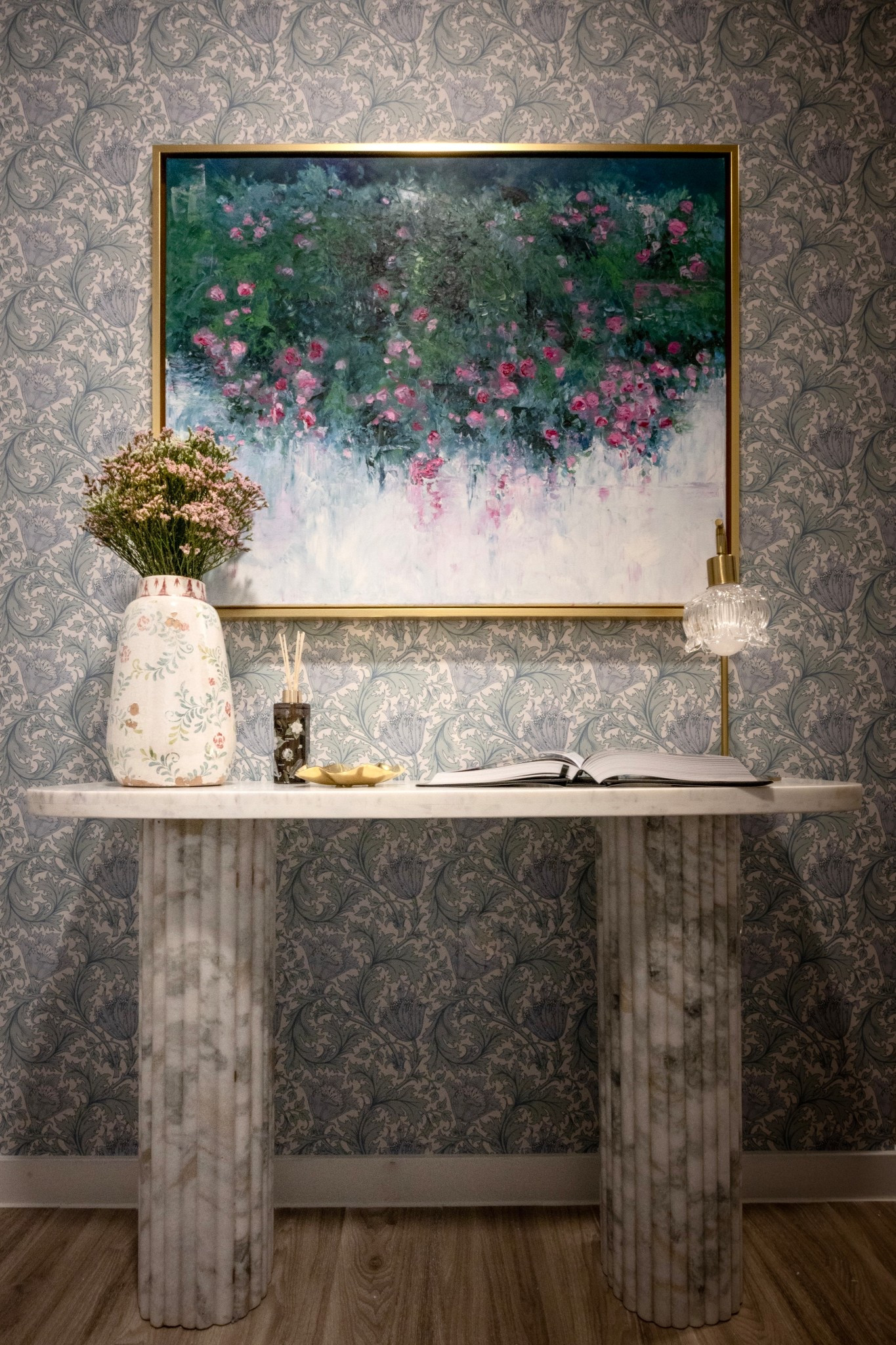 I’m obsessed with how this entry came together — the wallpaper, the marble console, and that art…in love

#LTKHome