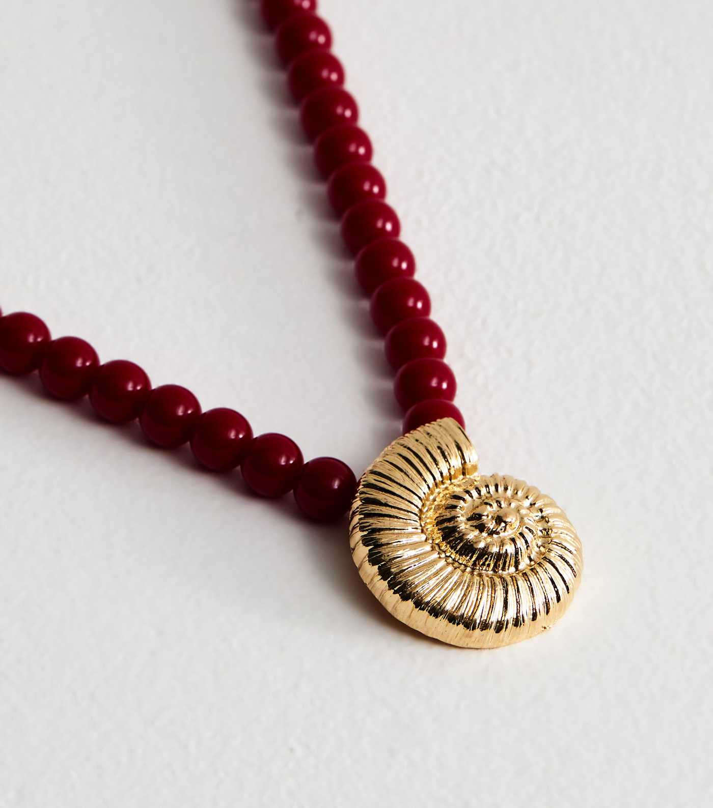 Red Beaded Swirly Shell Pendant Necklace | New Look | New Look (UK)