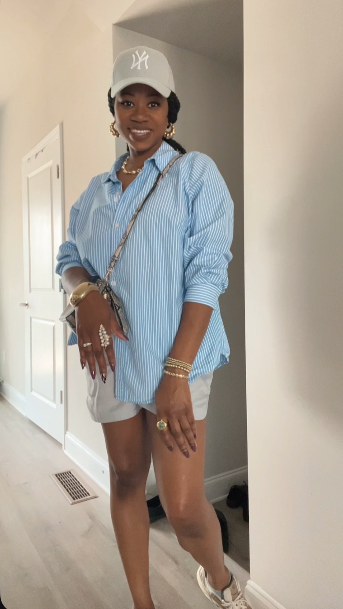 Elevated casual outfit. Blue button down shirt with grey nike shorts and grey yankee hat

#LTKSaleAlert #LTKStyleTip #LTKFindsUnder50