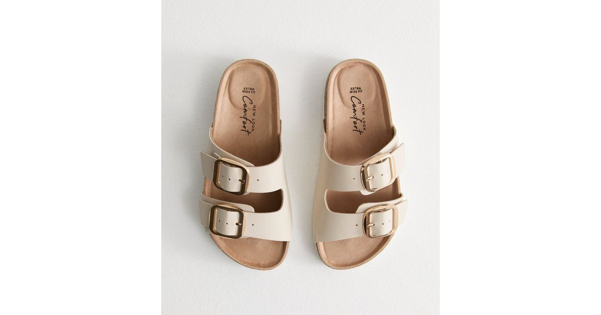 Extra Wide Fit Off White Faux Leather Buckled Strap Flat Sandals | New Look | New Look (UK)