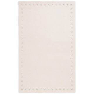 Metro Ivory 8 ft. x 10 ft. Dotted Border Area Rug | The Home Depot