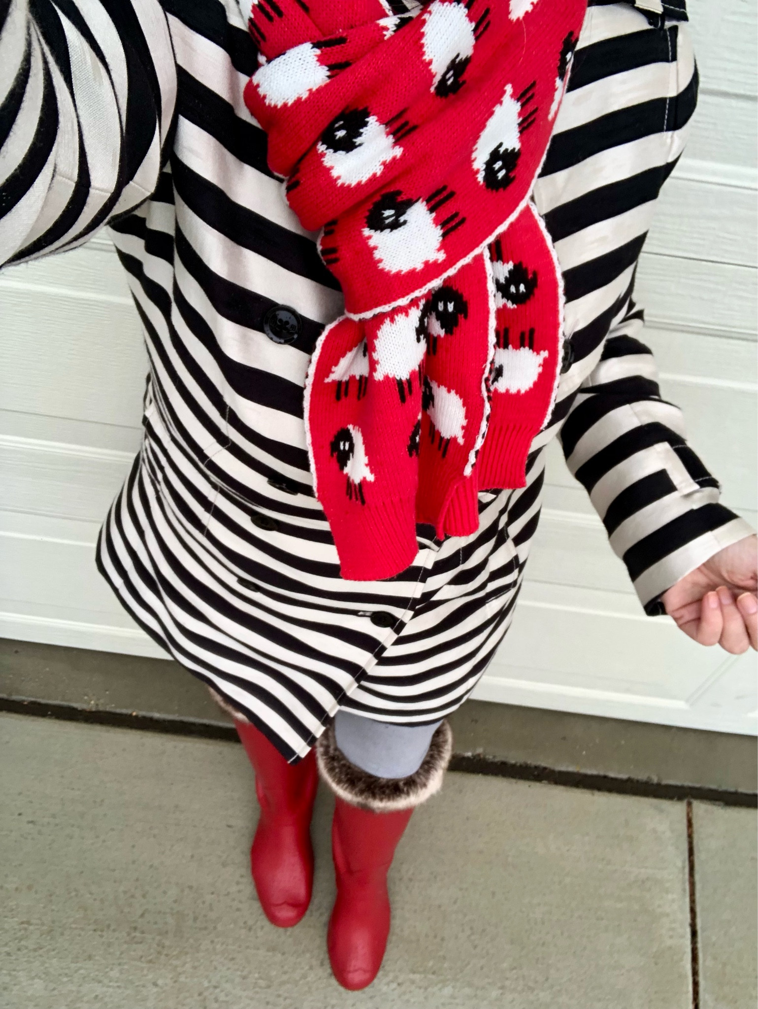 Can you spot the black sheep? I love this print! It’s a great ‘Warm & Wonderful' look-alike! #rainyday #spring #trenchcoat #LTKunder50 #wellies #scarf #Hunterboots #joggers 

#LTKsalealert #LTKshoecrush #LTKSeasonal