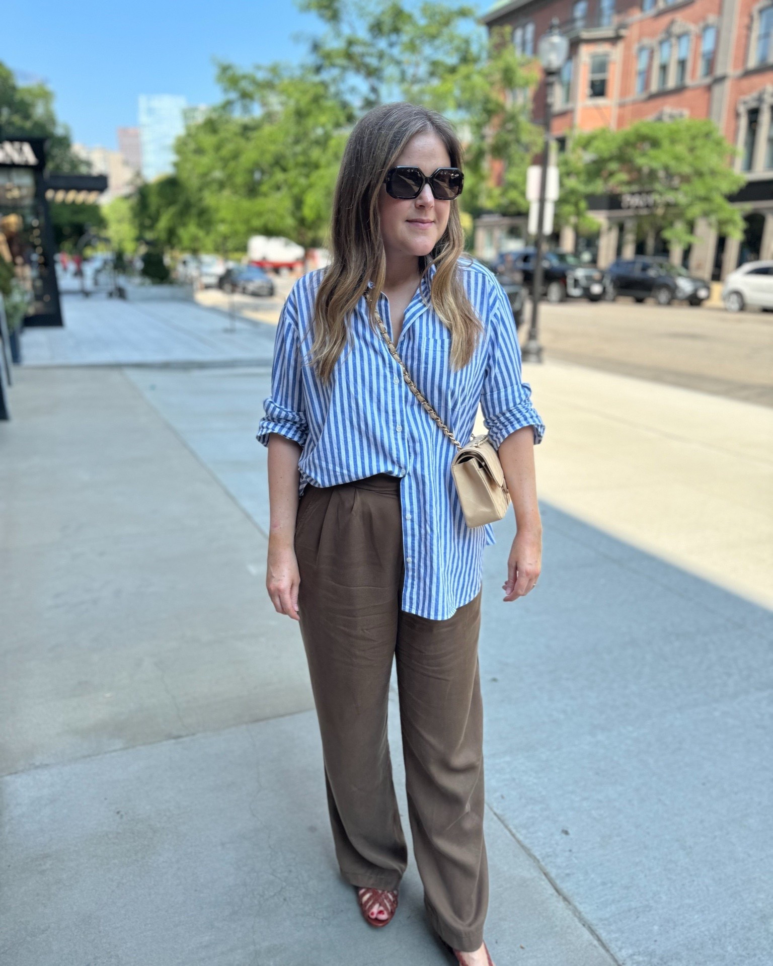 Striped shirt outfit idea. This shirt runs over sized, I recommend getting your true size. Pair with linen pants and a tank for a casual pre-fall look. 

#LTKSeasonal #LTKStyleTip #LTKWorkwear