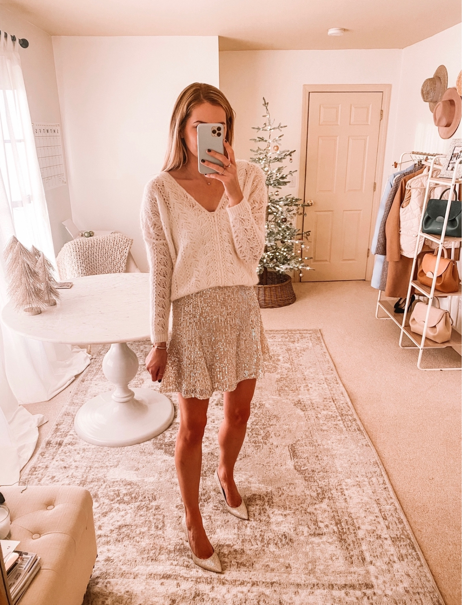 Holiday outfit: monochromatic look. Sequin skirt. Cream sweater. Sparkle heels 

#LTKHoliday #LTKCyberweek #LTKSeasonal