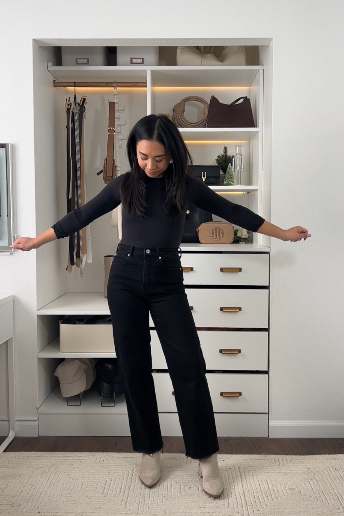 The Way High Jean from Everlane – these are my favorite pair of black denim, they have just enough stretch to be comfortable and fit TTS 

I wear size 25 in the 27.5” inseam.

#LTKStyleTip #LTKFindsUnder100 #LTKCyberWeek