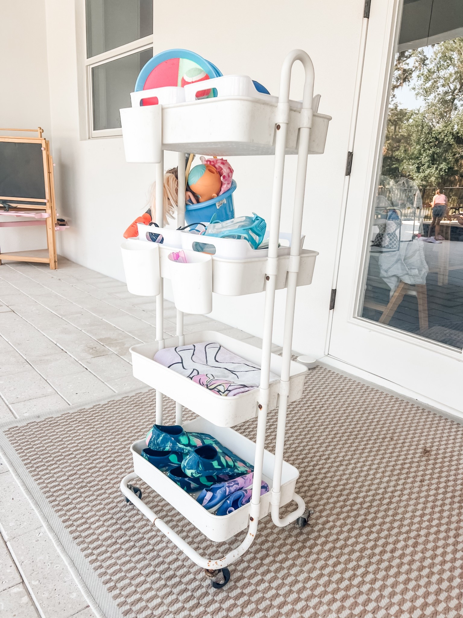 Outdoor pool cart for toys and summer essentials! This is perfect for all the kids pool toys and goggles!

#LTKKids #LTKFamily #LTKSeasonal