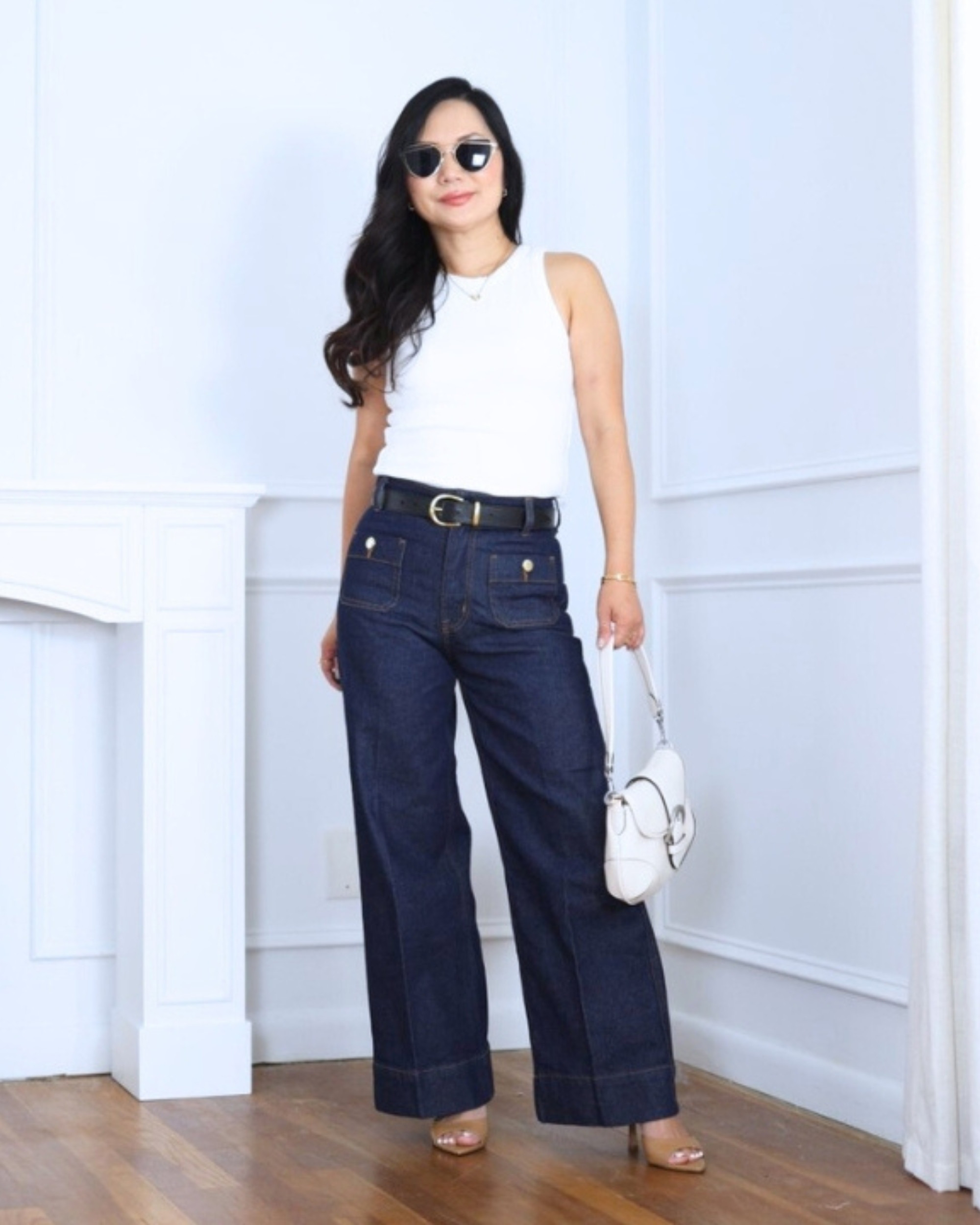 This ribbed tank top is such an easy staple—simple but always flattering. I paired it with dark wash wide-leg jeans from H&M for a clean, balanced look, then added a bag from Quince to keep everything polished but still relaxed. I’m 5’2, wearing size S.

#LTKPetite #LTKStyleTip #LTKOver40