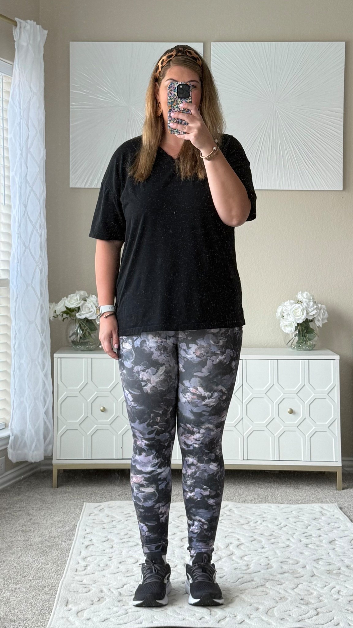 An easy, comfy outfit that still feels put-together - perfect for work-from-home days or a simple Saturday on the go. The black v-neck short-sleeve oversized tee and floral leggings with pockets are super soft, flattering for midsize and plus-size, and great for lounging or errands. Add a comfy leopard headband and black Brooks running shoes for that effortless, mom-on-the-move vibe.

Outfit details:
🖤 Oversized basic black tee
🌸 Floral leggings with pockets
🐆 Leopard headband
👟 Black white Brooks sneakers

easy mom outfit, work from home outfit, comfy leggings outfit, casual fall outfit, midsize outfit idea, plus size casual outfit, athleisure look, weekend outfit, Amazon outfit idea, everyday mom style, comfortable fall outfit, simple Saturday outfit, floral leggings outfit, head to toe Amazon outfit 

#LTKTall #LTKFindsUnder50 #LTKMidsize