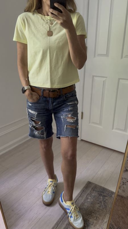 The perfect length simple t-shirt that comes in several different colors. This yellow is perfect for my Adidas gazelles but oops I should have ironed it | ripped Bermuda Jean shorts | 

#LTKStyleTip #LTKVideo #LTKOver40