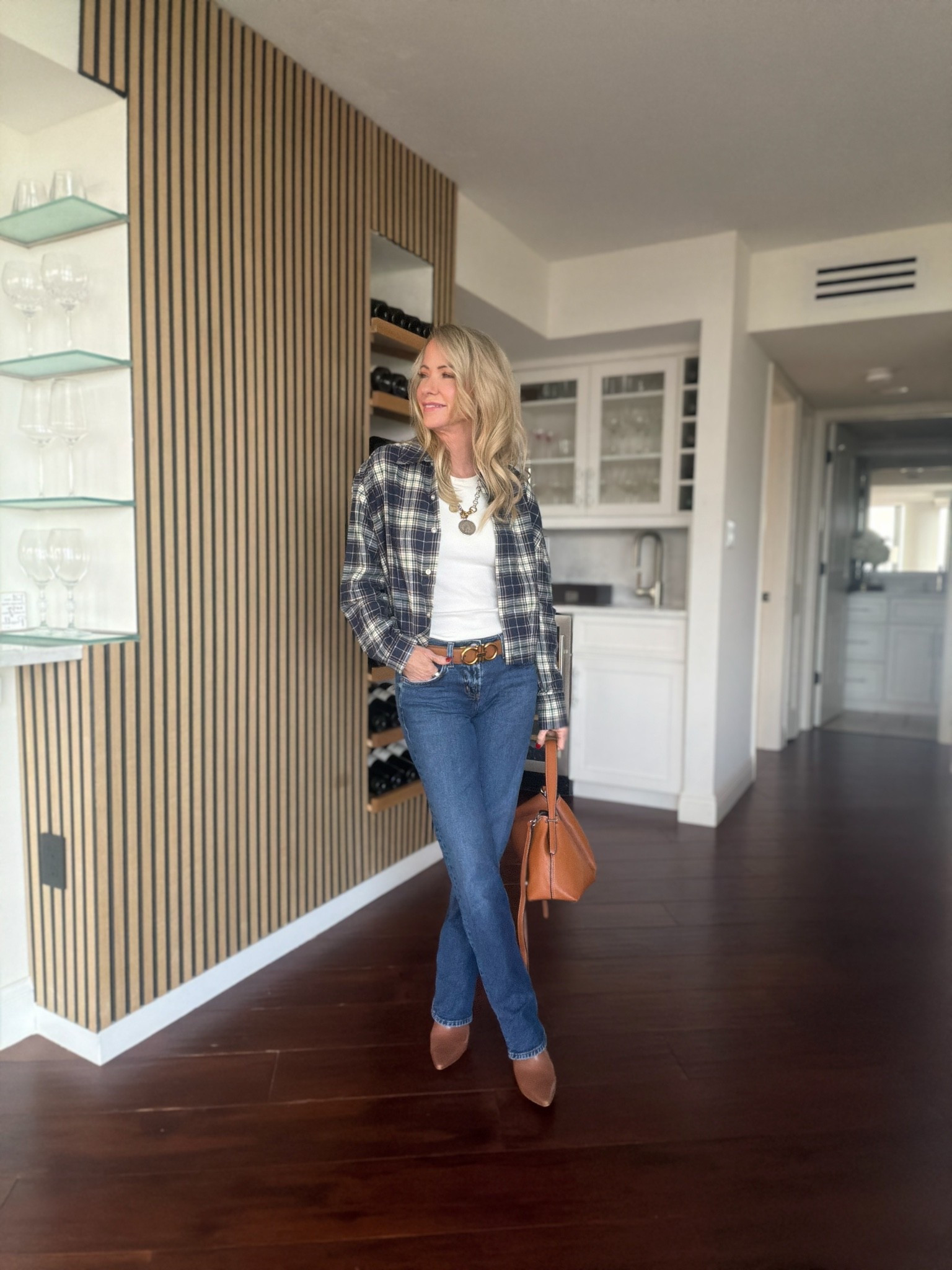 One plaid shirt, so many ways to wear it. I styled mine with classic denim, a simple white tank and warm brown accessories for an easy, polished fall look. This is one of those pieces I’ll be reaching for all season. Everything linked here!

#LTKootd #LTKOver40 #LTKSeasonal