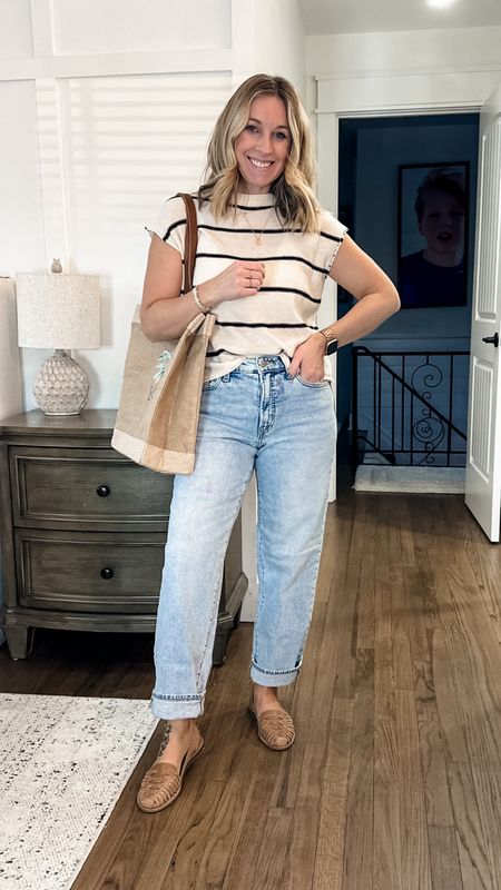 Love love this outfit for warm weather or vacation. It’s perfect for spring too if you add a cardigan that you can remove when it’s warmer during the day! 
Small top. Tts jeans in regular. True to size sandals! I did NOT need to size up. They mold to your foot and stretch. So comfy! 

#LTKstyletip #LTKSpringSale #LTKfindsunder100