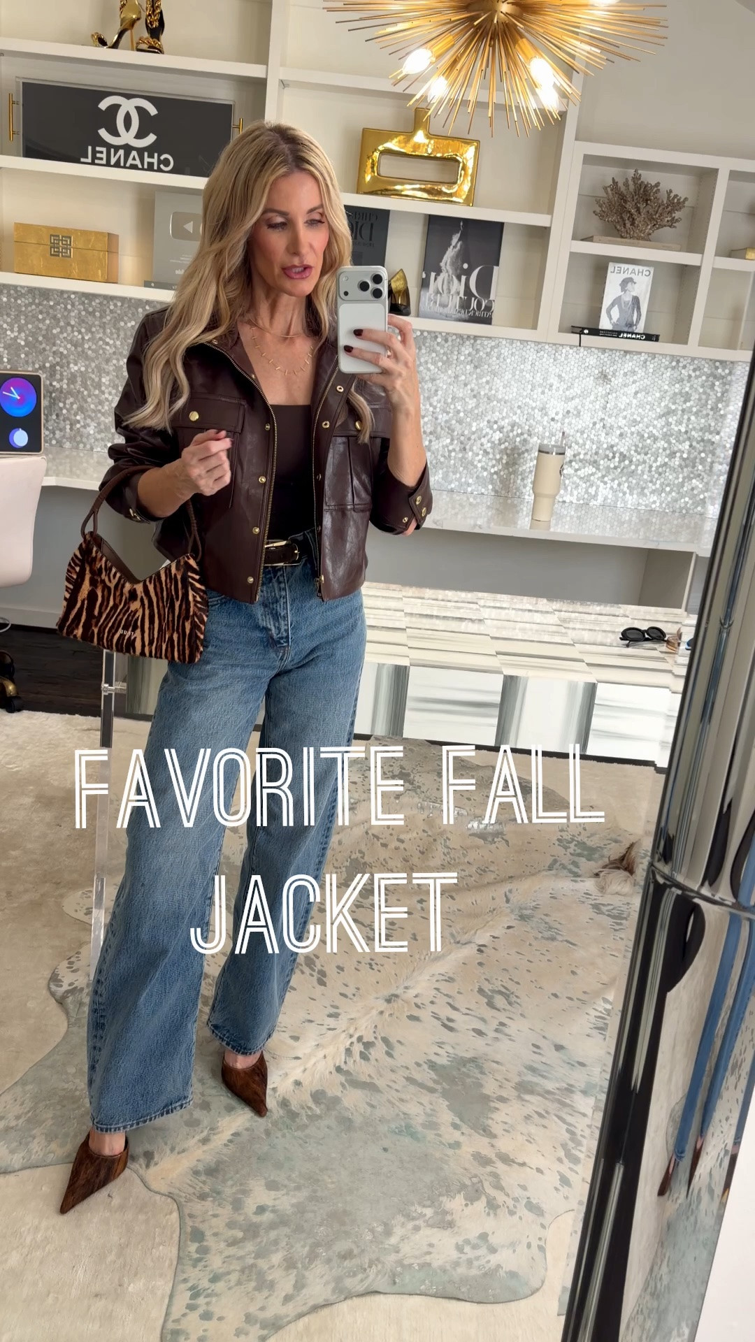 Burgundy is THE color of fall, and this vegan leather bomber is my favorite jacket of the season.

	1.	The color. A rich, deep burgundy that flatters every skin tone and instantly elevates a simple outfit.
	2.	The details. The gold luxe buttons make it look far more expensive than it is.
	3.	The versatility. Throw it over denim, a slip skirt, or a sweater dress, and you're done.

I paired it with my favorite FRAME Bow jeans. The high-waisted, soft barrel silhouette is modern, flattering, and the perfect balance to a cropped bomber.

Sizing: 	•	Jacket: True to size. I'm wearing an XS.
	•	Jeans: Run big, so size down one. I'm wearing a 23.

#LTKootd #LTKgrwm #LTKOver40