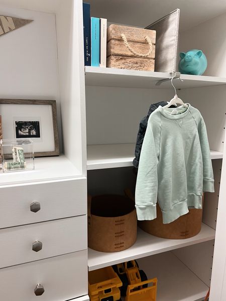 shelf dividers come in a set of 2 for $10. Love for creating separate shelf spaces or organizing sweaters. The hook is great for hanging the next days outfits and Logan can reach with his stool 

home organization, kids bedroom 

#LTKunder50 #LTKkids #LTKhome