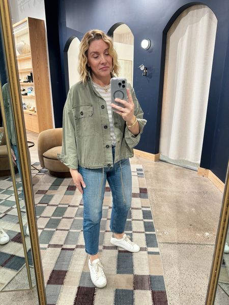 Spring outdoor event look: neutral striped short-sleeve tee, army green utility layering jacket, jeans and sneakers (exact not available but linking super similar) All tts. Allison in a medium on top and a 29 in the jeans. 

#LTKSeasonal #LTKover40 #LTKstyletip