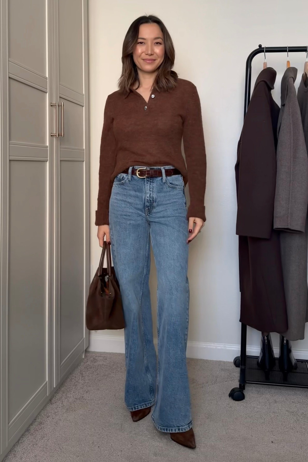 Classic & elevated outfit with jeans 

Br wool top 
Br wide leg jeans - size 25 
Demellier the midi New York tote 
Jcrew belt 
Jcrew boots 