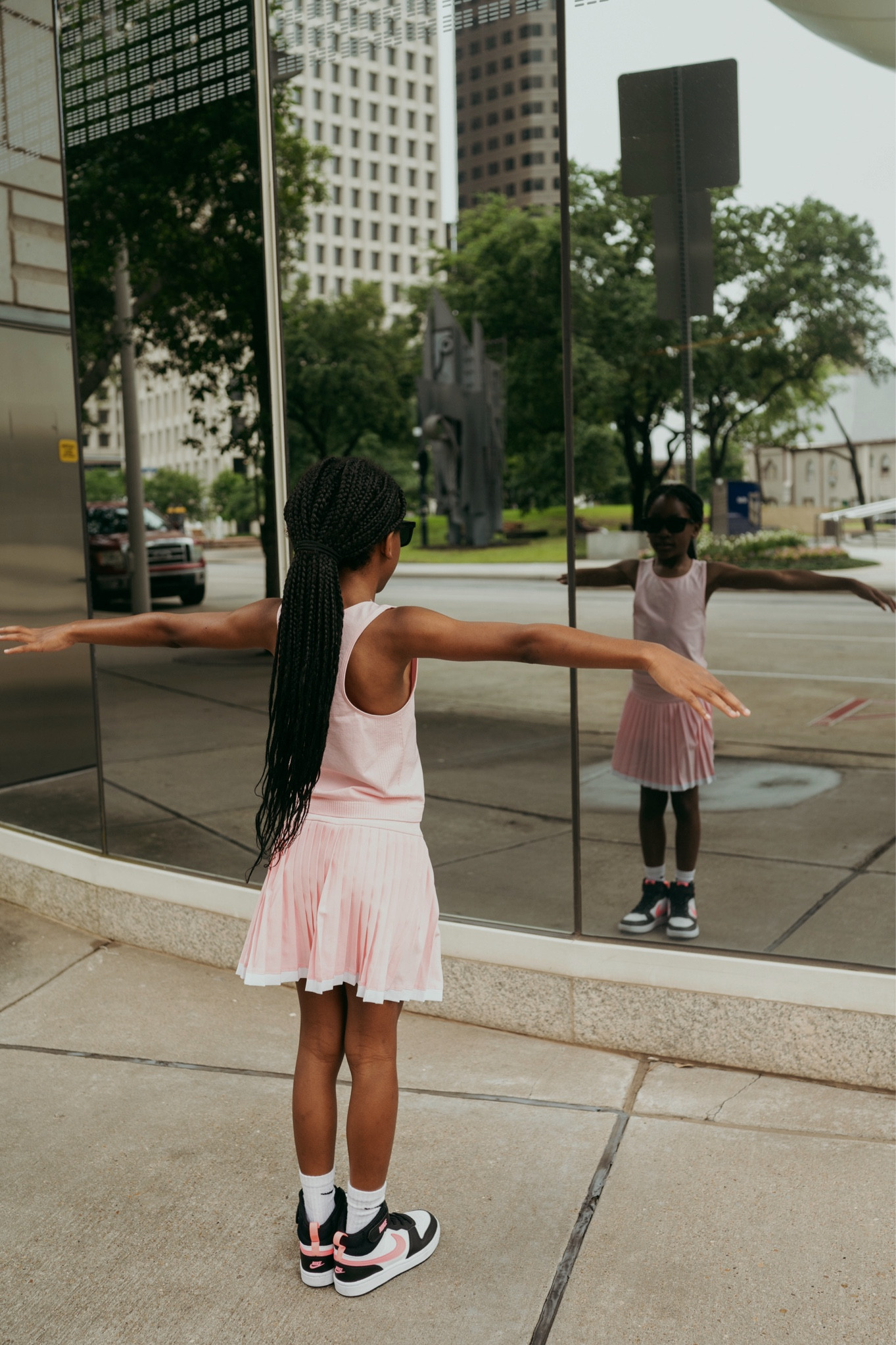 Back to school outfit: Girls black and pink Nike sneakers, pink tennis skirt and matching tank 

#LTKFamily #LTKKids #LTKShoeCrush