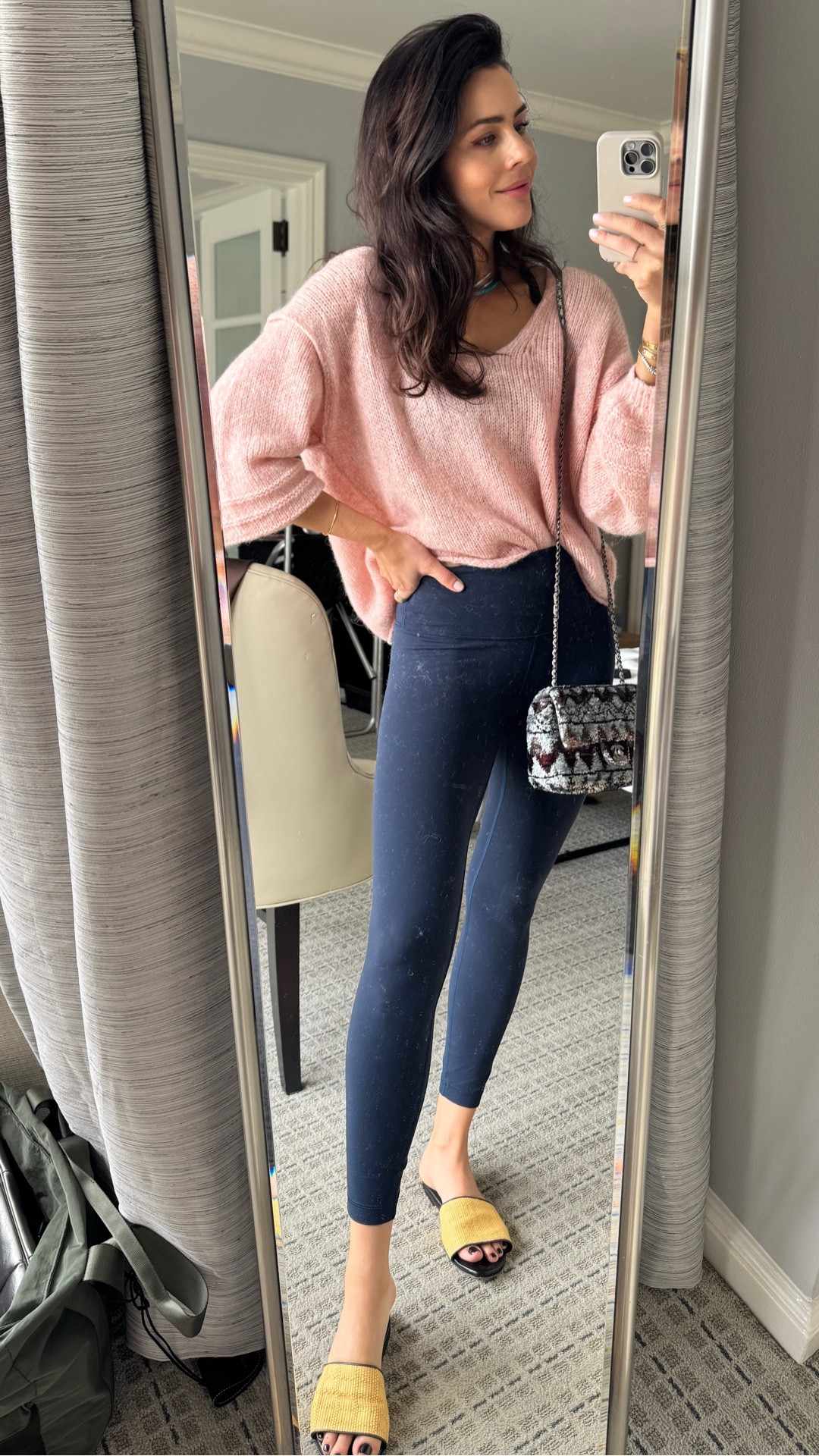 Morning yoga outfit 🧘‍♀️ Wearing the softest workout set — these are my favorite Lululemon leggings that smooth everything out and hold you in for any kind of workout. I’m wearing the 25” length, which is my go-to fit. Paired it with the matching top and this oversized spring sweater with a v-neck and bubble sleeves (comes in multiple colors).

I’m wearing a size small in the sweater, but I wish I would’ve sized up to a medium for a little more length in the sleeves. Such a perfect cozy layer for any outfit. 
Grab my purse from last night dinner because I have no time to change but it works perfectly with this outfit. Get 1 month free on your Vivrelle membership with code: DIANACAROLINA 

#LTKmorningroutine #LTKootd #LTKfitnessgoals