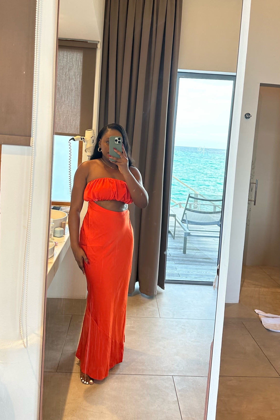 Orange silk dress 

#LTKtravel