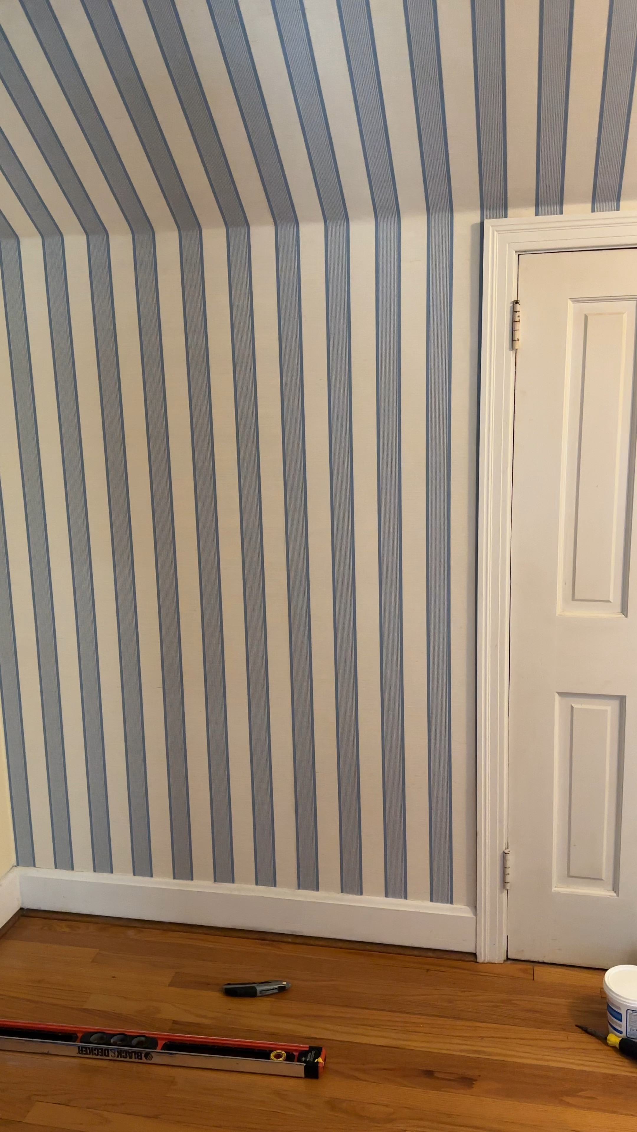 I stling this beautiful blue and white striped grasscloth in our upstairs hallway today. It’s on sale right now!

#LTKHome #LTKSaleAlert #LTKVideo