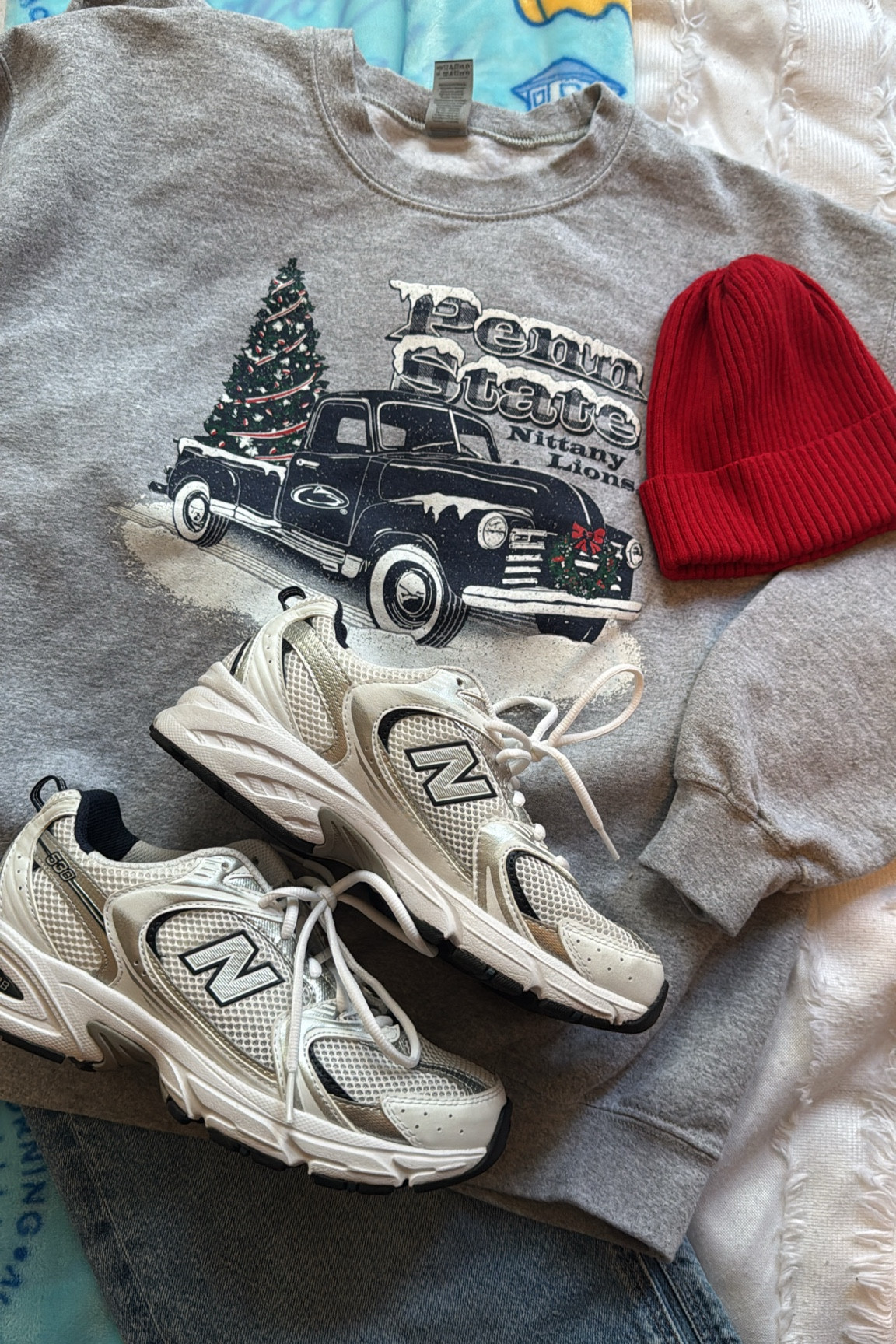 Cozy sweater, Penn state sweatshirt, vintage Penn state sweater, grey sweatshirt, new balance sneakers, new balance 530, silver sneakers, red beanie, red hat

#LTKStyleTip #LTKSaleAlert #LTKSeasonal