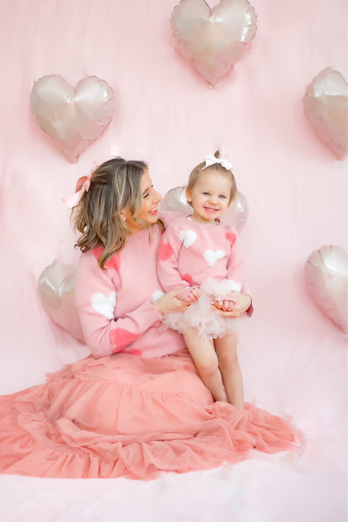 Valentines, galentines, heart sweaters, valentines outfits, valentines dress, pink backdrop, mommy and me 

Sweaters are from Bailey’s Blossoms, I linked similar ones! 

Bows are from Cottontail Bow & Co. 

#mommyandme #valentines #galentines #heartsweaters #valentinesoutfits 

#LTKSeasonal #LTKKids #LTKFamily