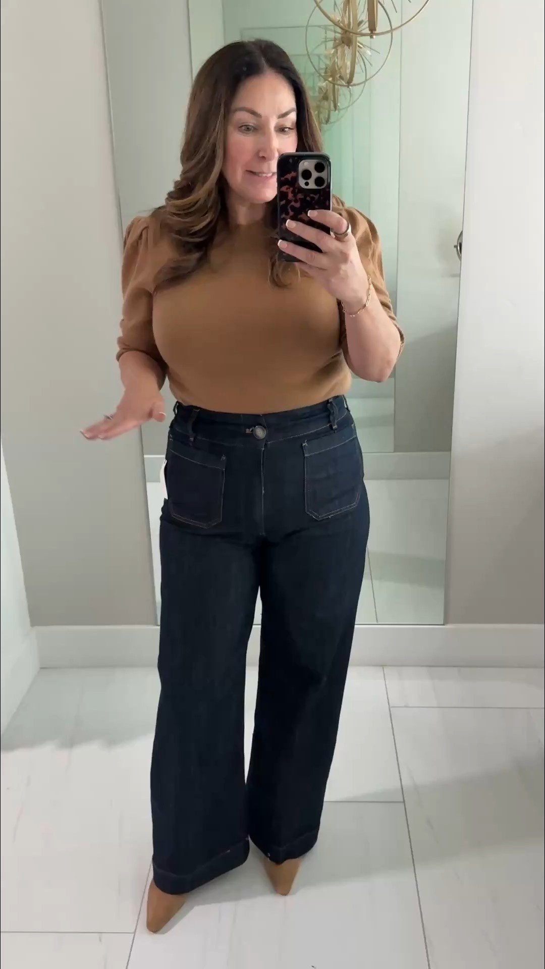 Wide leg pants great for work plus a little fun rant on women sizing! 🤬 Here’s what I found 

- Denim pants size up 1-2 sizes wearing 32
- Tan sweater tts, L
- Black Ponte pants tts, 32
- Green poncho sweater tts, L needs a cami
- Brown pants size down if in-between, 32

#LTKMidsize #LTKOver40 #LTKSeasonal