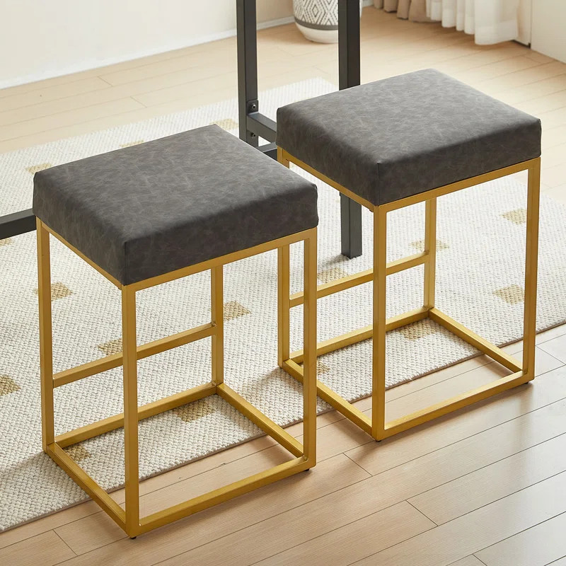 Ozel Upholstered 24'' Counter Stool | Wayfair North America