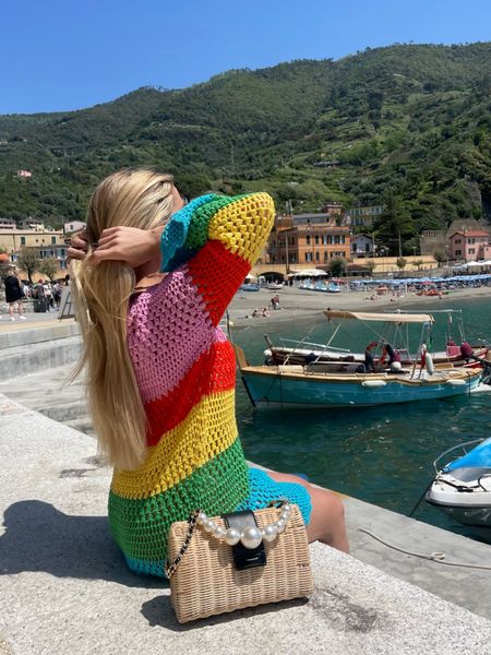 So many compliments on this happy colorful knit cover up - enough coverage to wear over a bikini and grab a drink on vacation 

#LTKswim #LTKtravel #LTKSeasonal