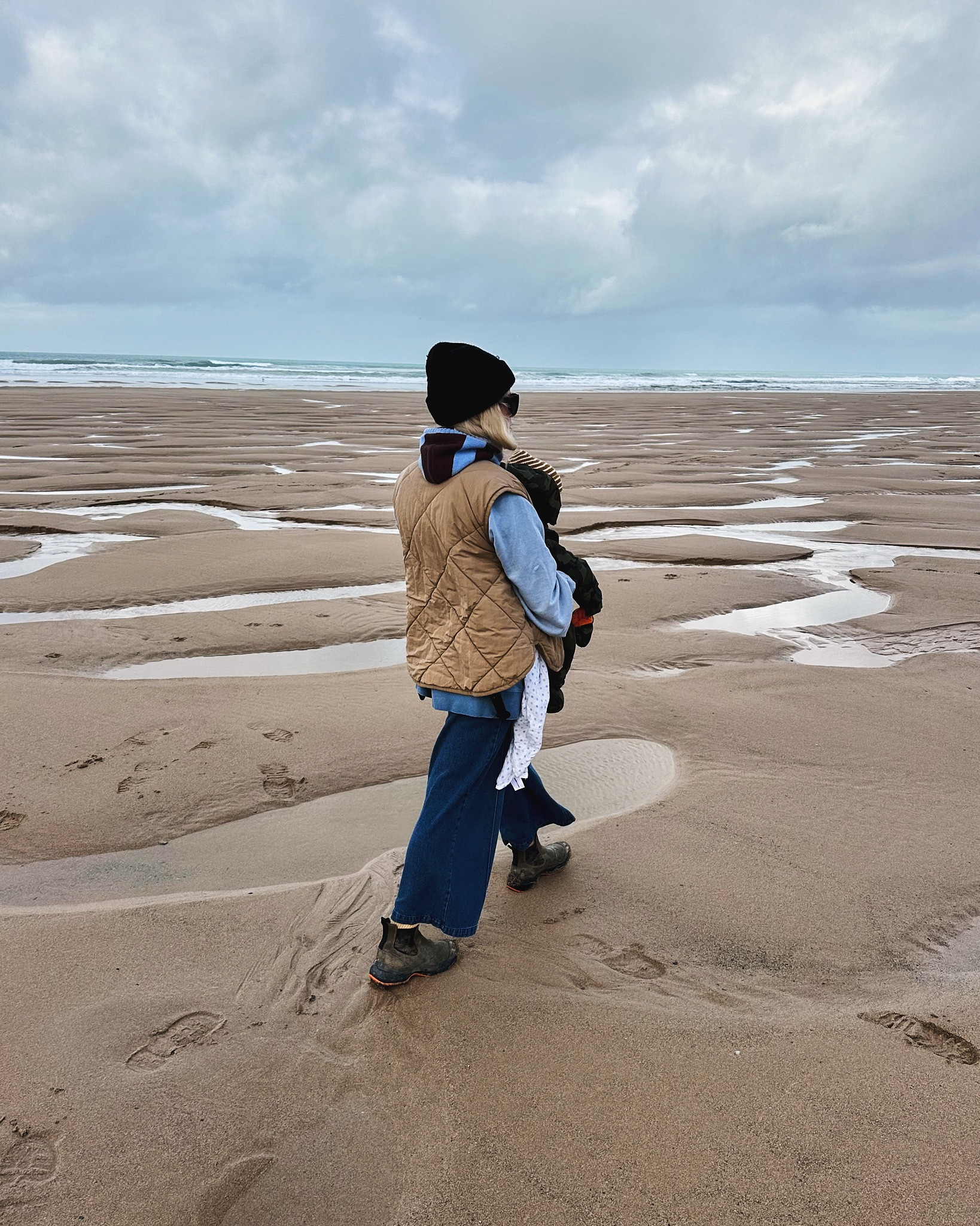 COS Beanie 
Damson Madder hood 
& Other Stories gilet 
H&M blue jumper 
FRNCH Jeans 
Woden boots 

#LTKSeasonal #LTKstyletip #LTKeurope