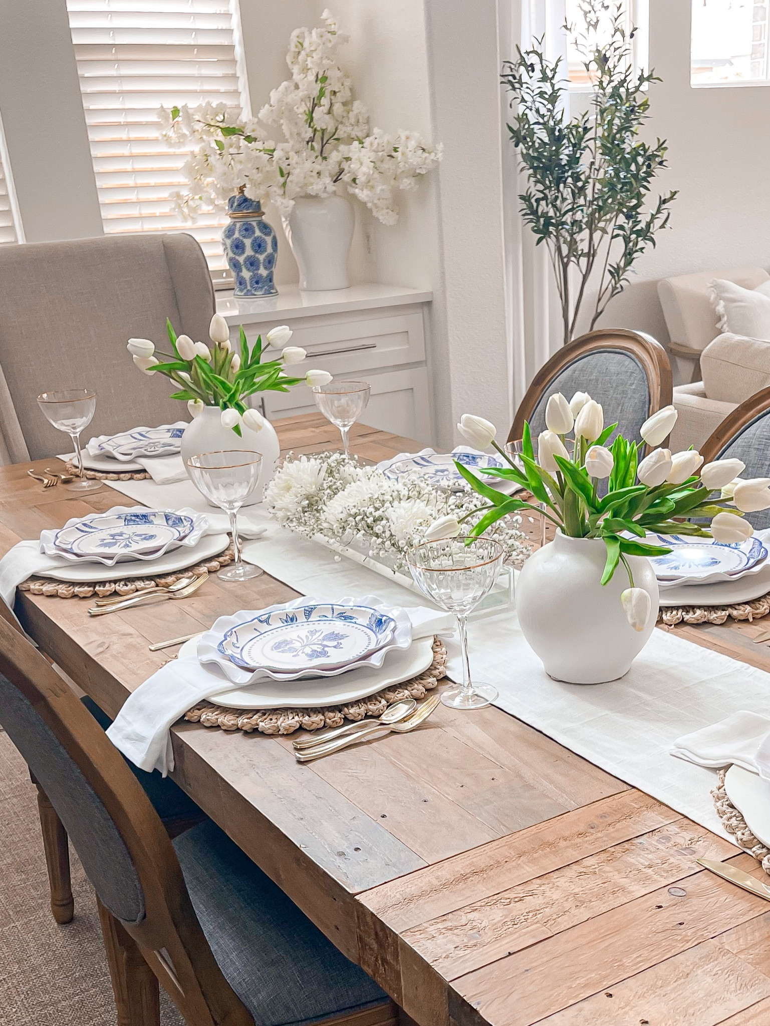 Spring tablescape — sharing a few recent amazon finds perfect for a spring table! Spring faux flowers - spring plates - blue and white plates - tablesetting - table styling - faux tulips 

#LTKsalealert #LTKhome #LTKSeasonal
