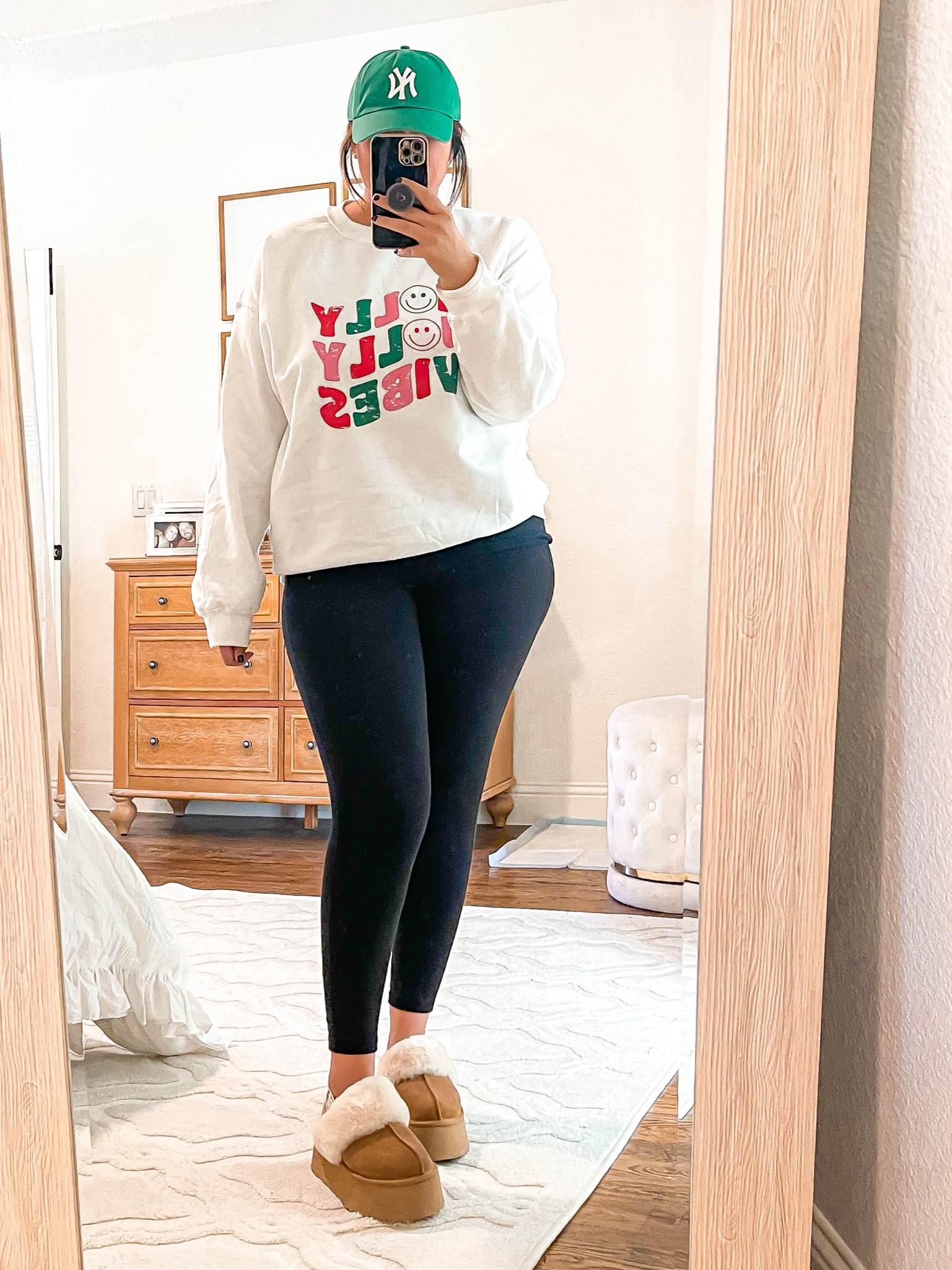 35 % off site wide at pink lily! Loving this Christmas sweatshirt. Wearing a size large. Sweatshirt, holiday sweatshirt, leggings, ball cap, uggs 

#LTKCyberweek #LTKHoliday #LTKSeasonal