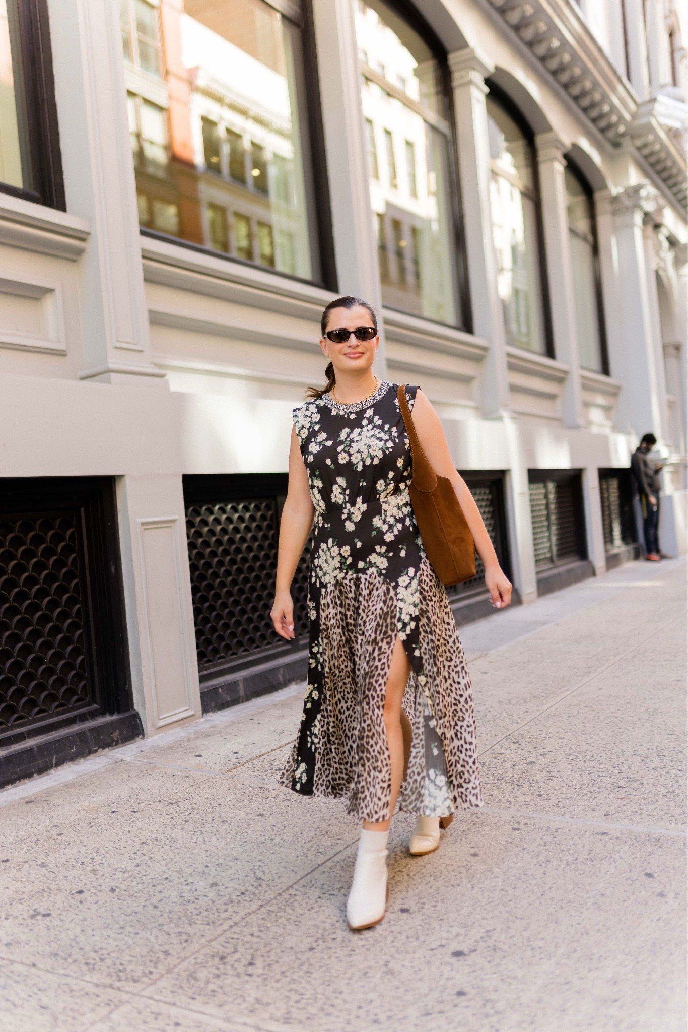 Fashion week outfit of the day! This mixed print midi dress from Rixo is so cute and I paired with some cream mini boots and my Coach Brooklyn suede bag.

#LTKootd