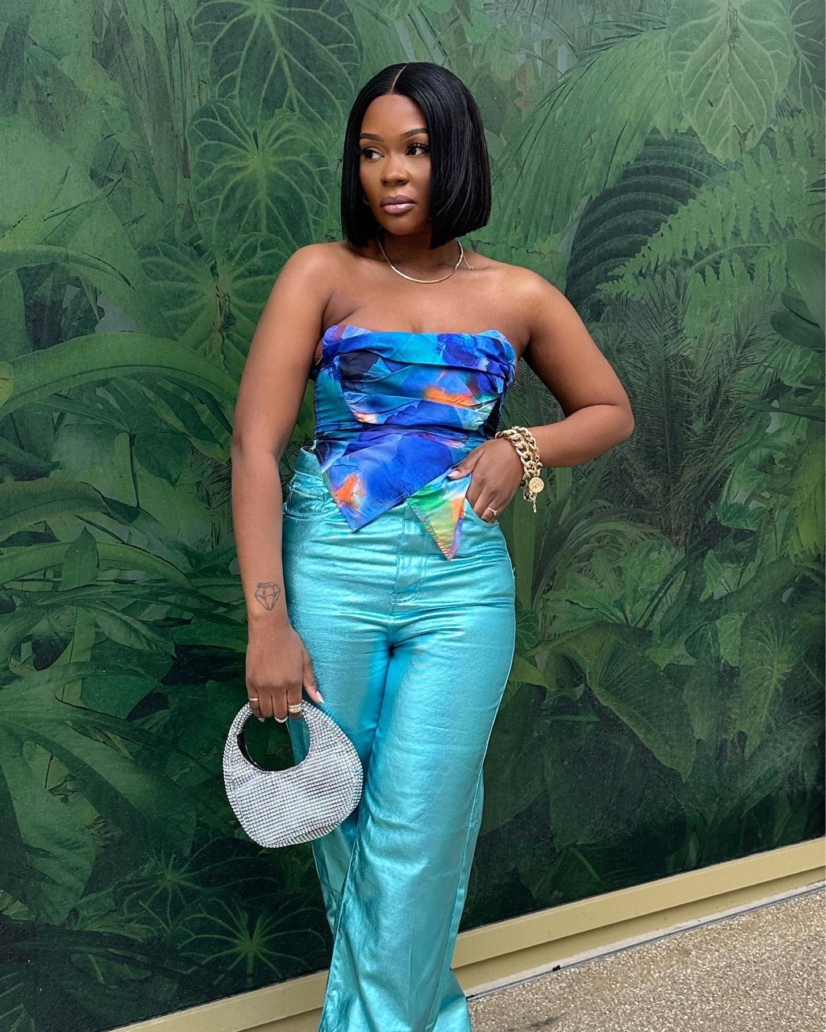 Blue mesh printed corset top, tube top, metallic trousers, blue trousers, Rhinestone bag, PLT 

#LTKSeasonal #LTKstyletip #LTKeurope