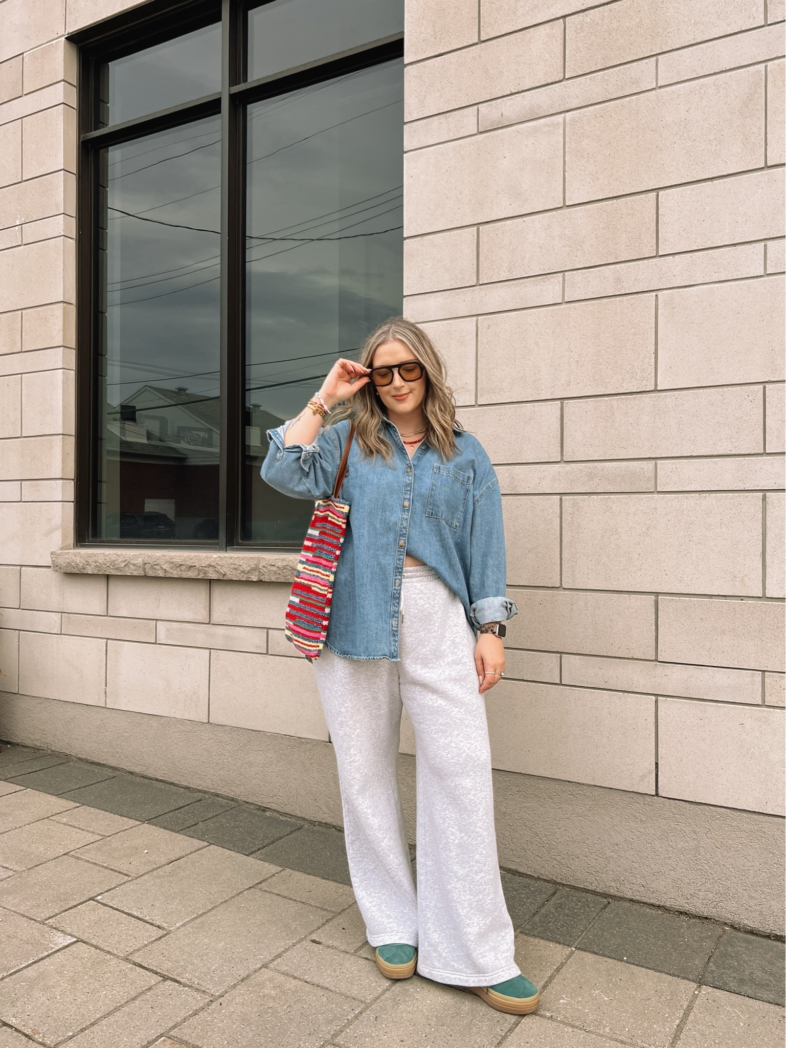 Comfy casual spring outfit! Canadian Old Navy & Gap links are under “similar products”. Wearing my usual size L in the oversized denim shirt (one of my most worn pieces!) and L in the wide leg sweatpants. This striped crochet bag is such a fun pop of color to make a simple outfit more interesting! Adidas gazelles a run a little big, I’m usually a 9.5-10 and wear a 9

#LTKmidsize #LTKsale #LTKbag