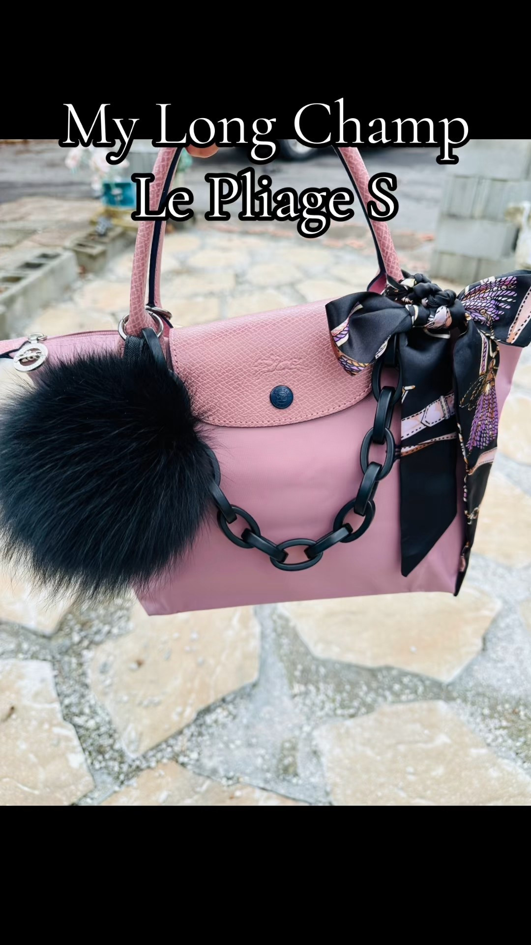 The Long Champ Le Pliage S is the BEST all weather bag! Super light and holds a lot! A ray of colors available! 
