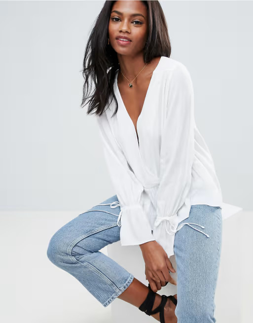 ASOS DESIGN Oversized Wrap long sleeve blouse with Dip Hem | ASOS US