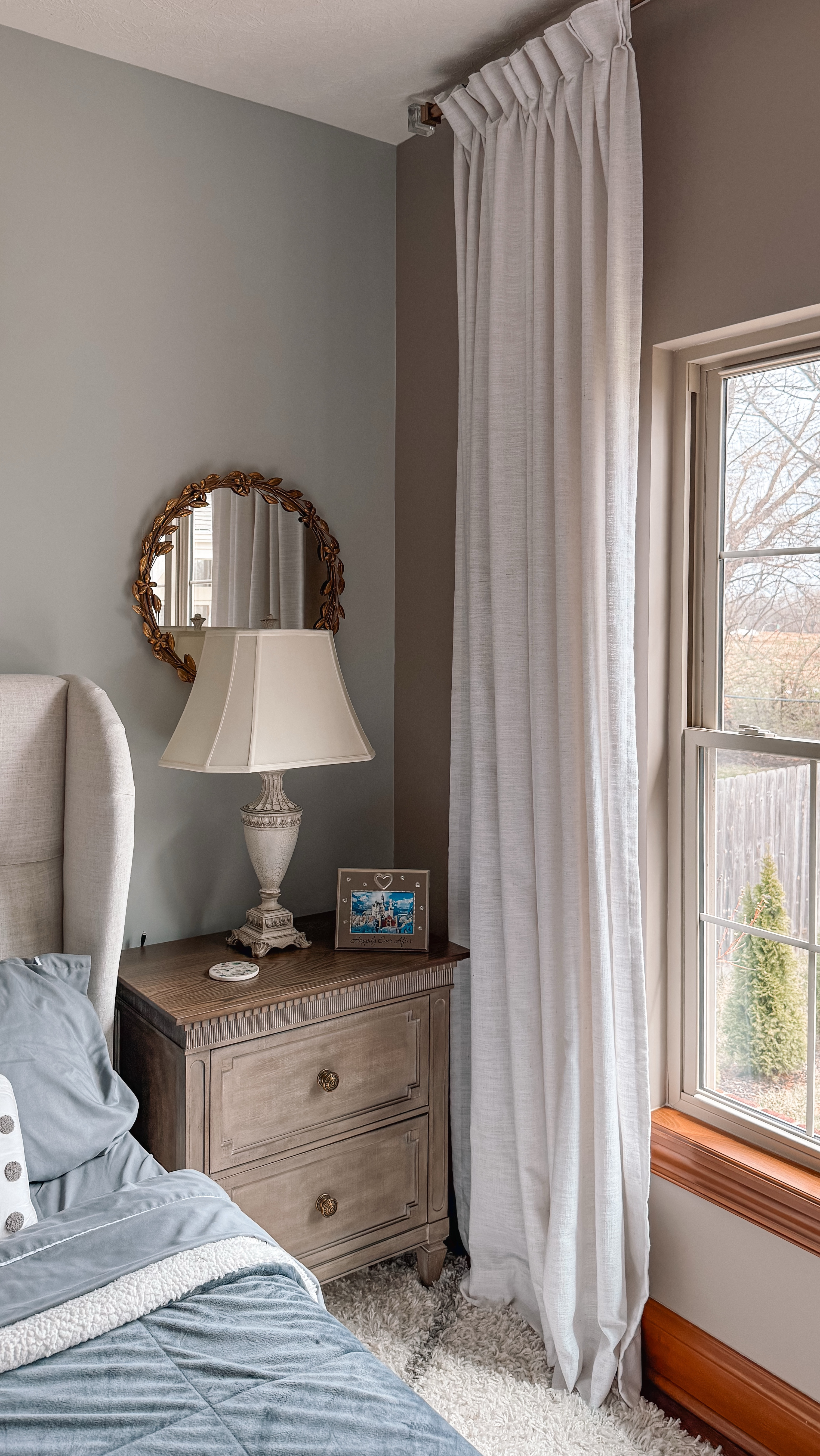 Neutral bedroom with an upholstered bed, rustic nightstands, and designer curtains. Layered textures and subtle patterns create a warm, inviting feel—transitional with a hint of farmhouse charm, perfect for a guest bedroom or master bedroom.

🗝️ upholstered bed, bedsheets, comforter, rug, neutral bedroom, guest bedroom, master bedroom, nightstands, designer curtains, bedding, lamps, gold mirror, farmhouse bedroom, bedroom decor, guest bedroom ideas, cozy bedroom inspiration, classic bedroom style, pleat curtains, neutral home decor, bedroom ideas, bedroom corner setup, bedroom essentials, Amazon Home Finds @AmazonHome

#LTKWatchNow #LTKHome