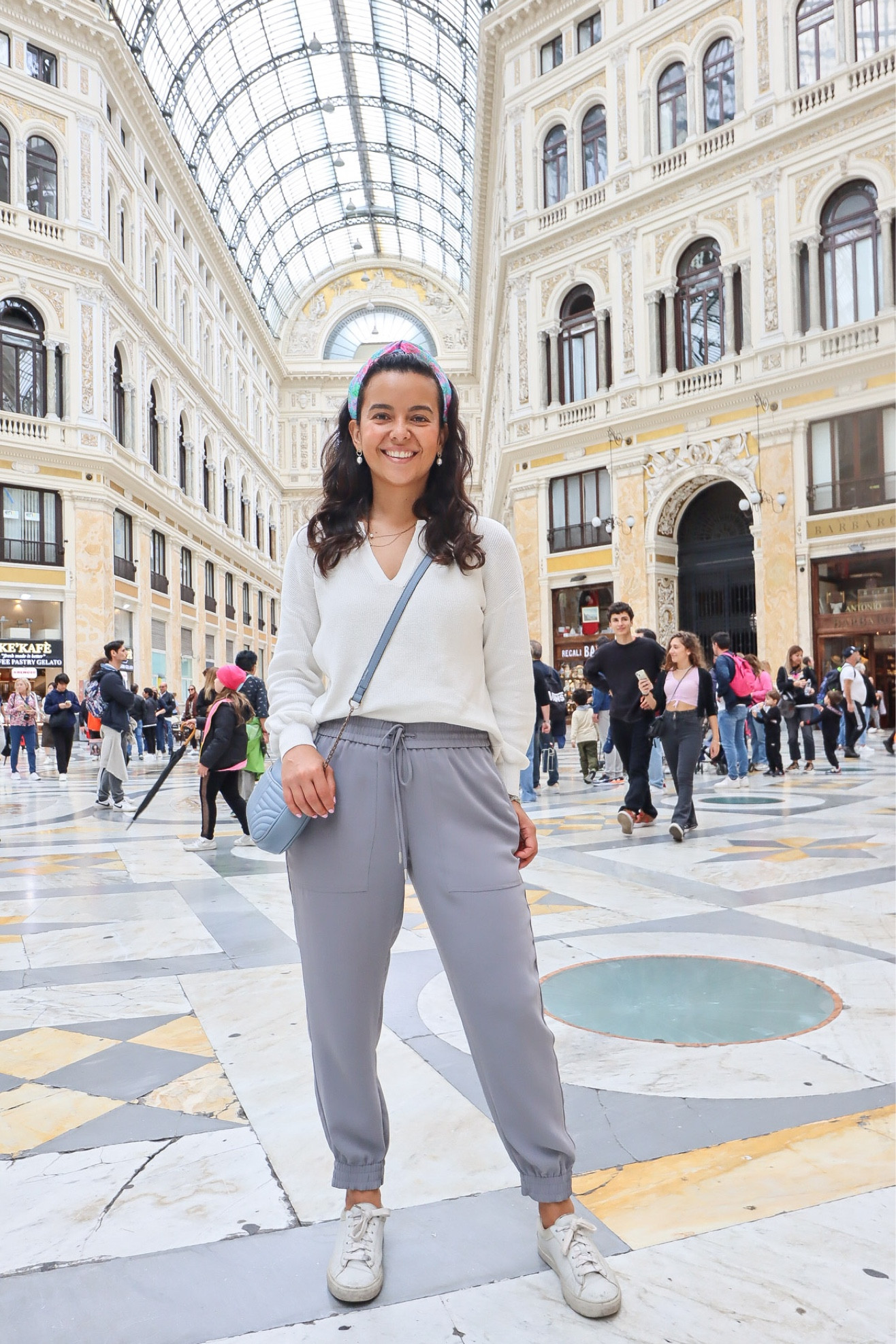 White sweater + grey joggers + a pop of color! 💕 Easy and comfortable travel look for my Fall in Italy capsule wardrobe! #travelstyle #capsulewardrobe 

#LTKeurope #LTKtravel #LTKstyletip