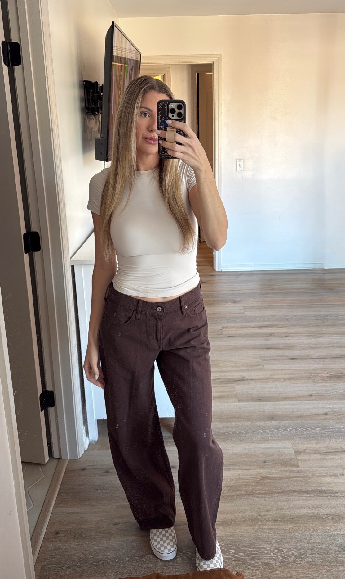 Casual outfit of the day with loose low rise brown jeans from Abercrombie and tan checkered vans 

#LTKootd #LTKmomlife #LTKdayinmylife

#LTKxAbercrombie #LTKootd #LTKgrwm
