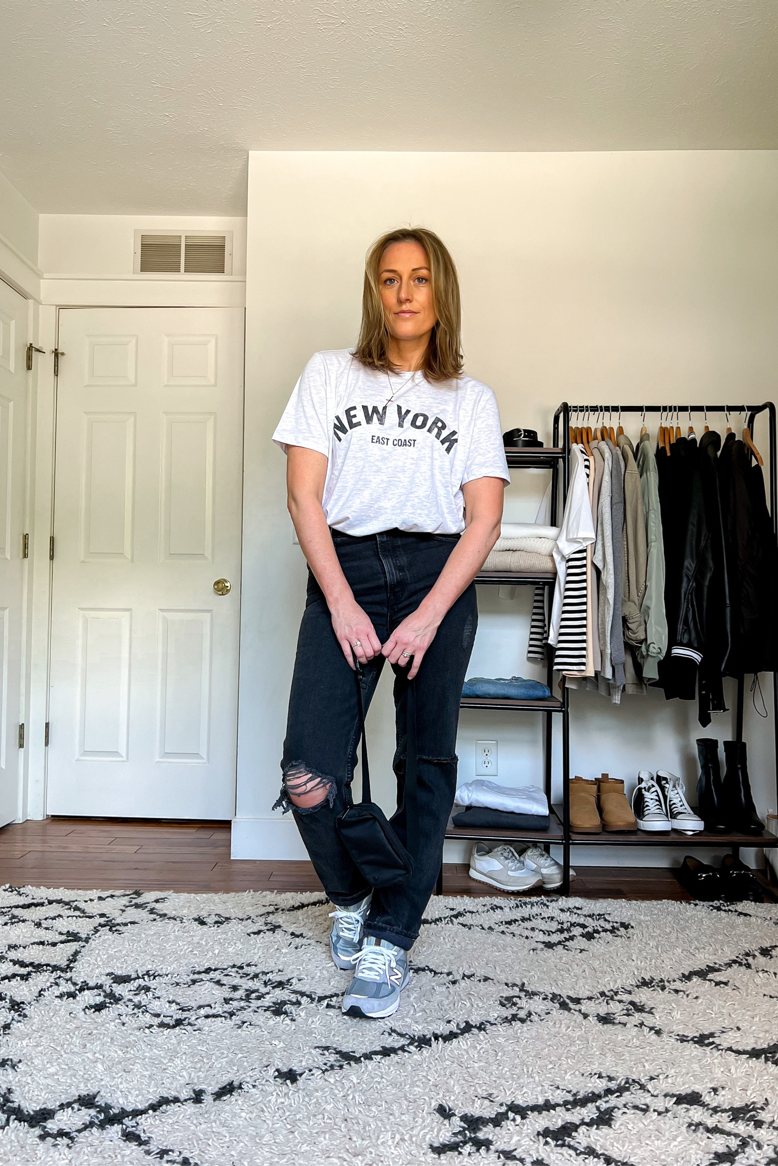 Casual outfit idea. Summer outfit idea. Graphic tee. Black straight fit jeans. Abercrombie jeans. Sneakers. Running shoes. New Balalance shoes. Belt bag.

Sizing
Tee is a large, for an oversized fit. Jeans are a 4/27 regular.
Shoes are TTS.

#LTKunder100 #LTKSeasonal #LTKstyletip